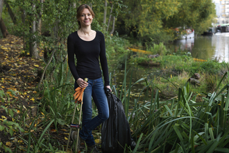 Kathryn volunteering by the river