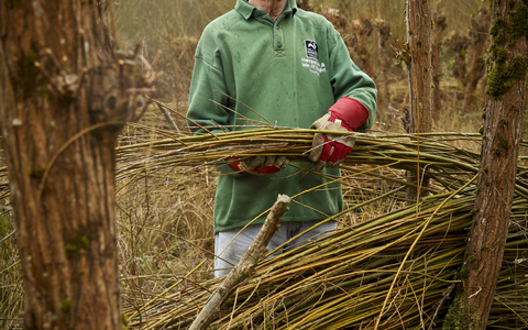 Malcolm volunteering on a reserve