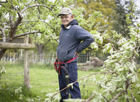 Martin stands in a garden